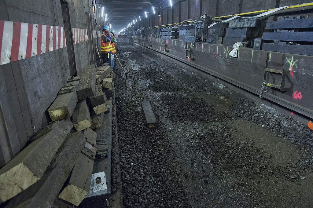 Workers replace track on the L line in April 2015. Photo by Patrick Cashin via the MTA Flickr