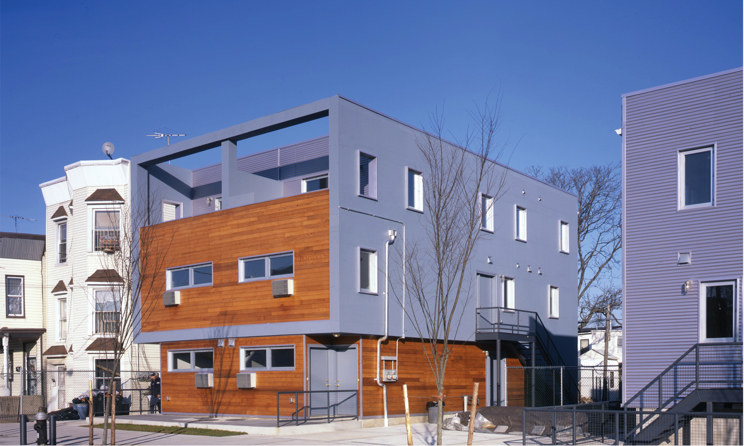 Homes at Glenmore Gardens in East New York, built in 2007 through Bloomberg's New Foundations program. photo via LTL Architects
