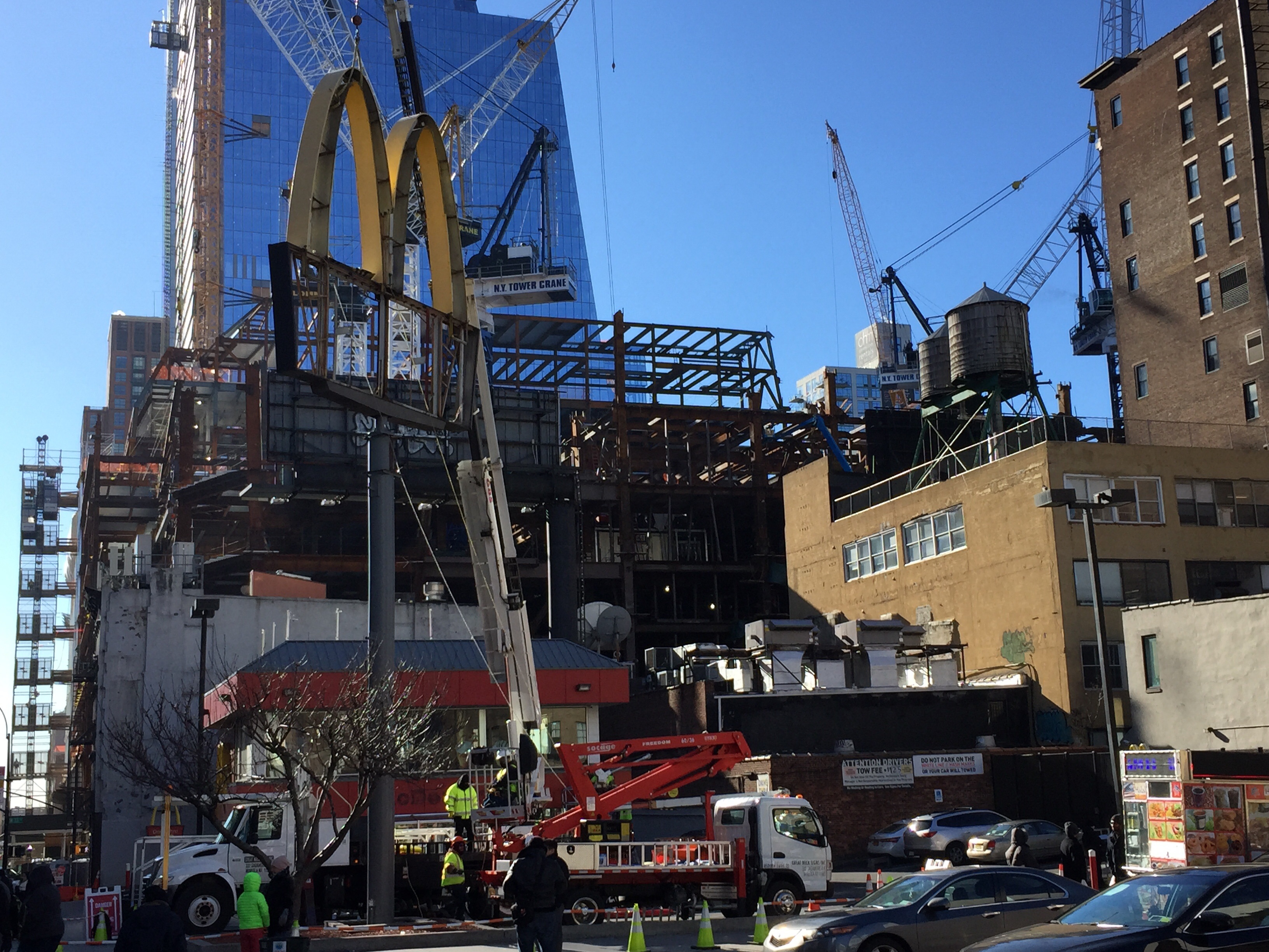 Demolition of the McDonald's at 427 Tenth Avenue, with 10 Hudson Yards in the distance. Photo by YIMBY user Robert Walpole.