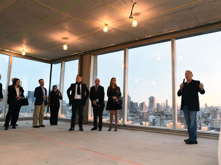 Ian Schrager at 215 Chrystie with west-facing windows behind him. Photo by Ilya S. Savenok/Getty Images for 215 Chrystie