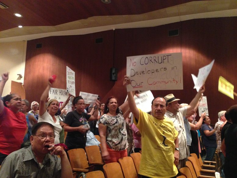 Housing activists chant during a meeting on Rabsky Group's planned Broadway Triangle development. all photos by Rebecca Baird-Remba for YIMBY