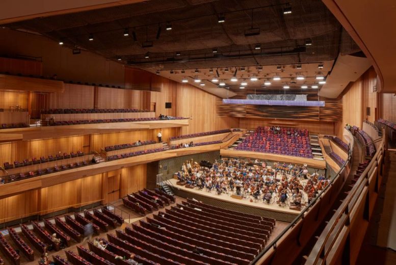 The New York Philharmonic rehearsing on stage inside the Wu Tsai Theater at the new David Geffen Hall; orchestra view from house right – Photo by Chris Lee, Courtesy of New York Philharmonic
