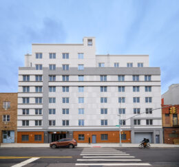 Garden Towers Exterior Detail: Developed by Foxy Management, in partnership with HANAC, Inc. and JLD Advisory LLC, Garden Towers includes two residential buildings – rising seven stories and eight stories – that together offer a total of 149 rental homes for low-income adults age 62 or older. (Credit: David Joshua Ford)